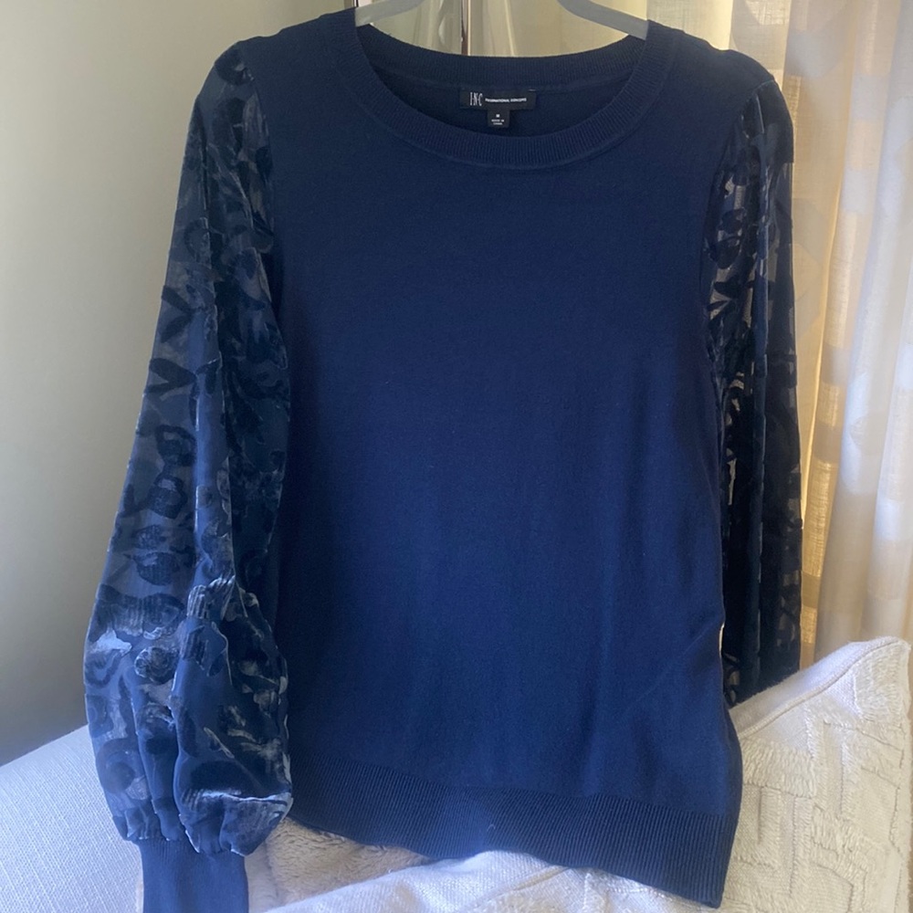 I.N.C. International Concepts, sweater. Sleeve detail with floral fabric.